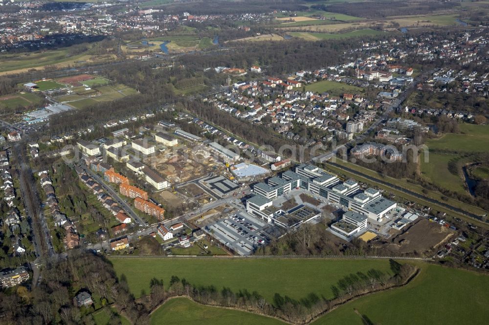 Aerial photograph Hamm - View of the construction site for the new build Campus Hamm of the Hochschule Hamm-Lippstadt in the state North Rhine-Westphalia. At Marker Allee on the banks of the river Ahse new buildings to be used as auditoriums, seminar rooms, media center, canteen and office space are being developed, overseen by architect firm pbr Planungsbuero Rohling AG