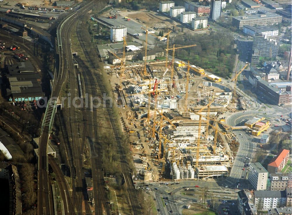 Aerial photograph Köln - Construction on the new building of the venue LANXESS arena (until 2008 Cologne Arena) and the complex of buildings of the Technical Town Hall in Cologne in North Rhine-Westphalia