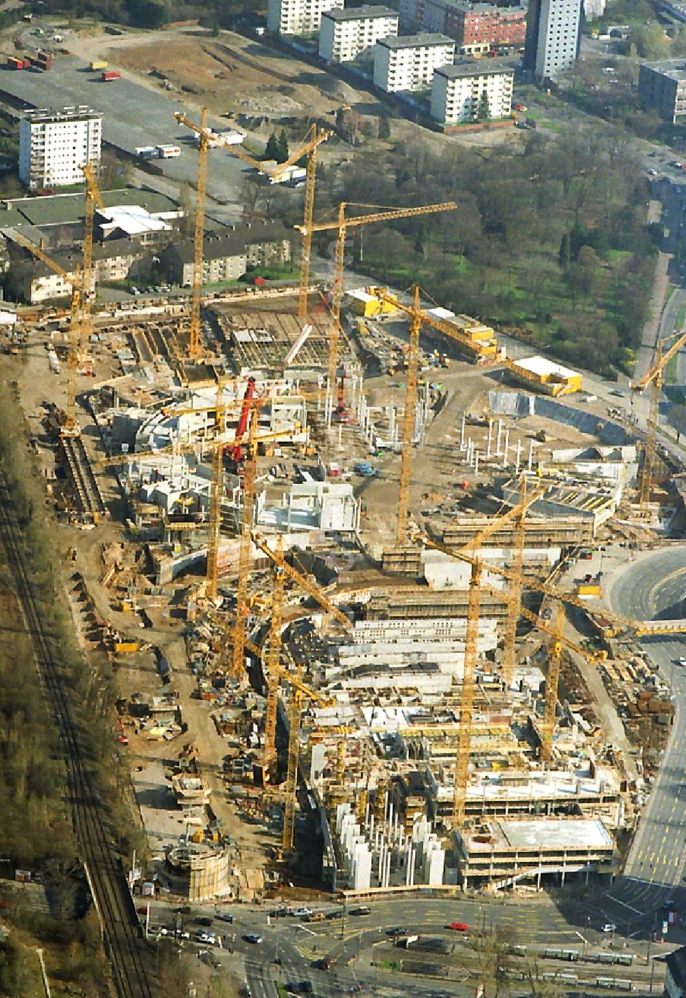 Aerial image Köln - Construction on the new building of the venue LANXESS arena (until 2008 Cologne Arena) and the complex of buildings of the Technical Town Hall in Cologne in North Rhine-Westphalia