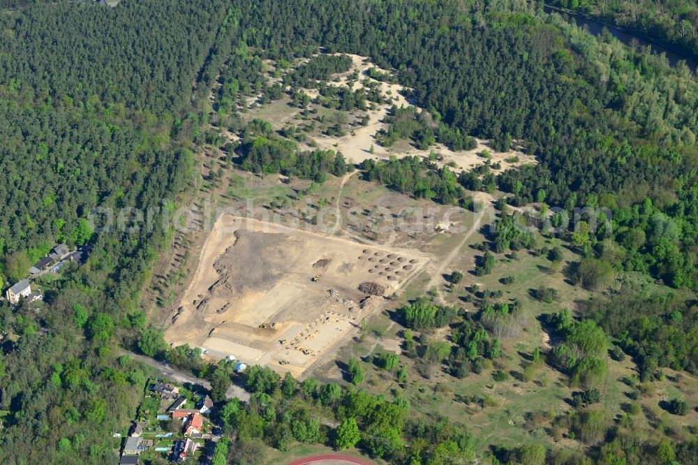 Stahnsdorf from above - Construction works on the Kanalaue Region in Stahnsdorf in the state Brandenburg. The landscape is being developed as a tourism and green region. Several machines and vehicles are working on the open sandy area which is surrounded by forest