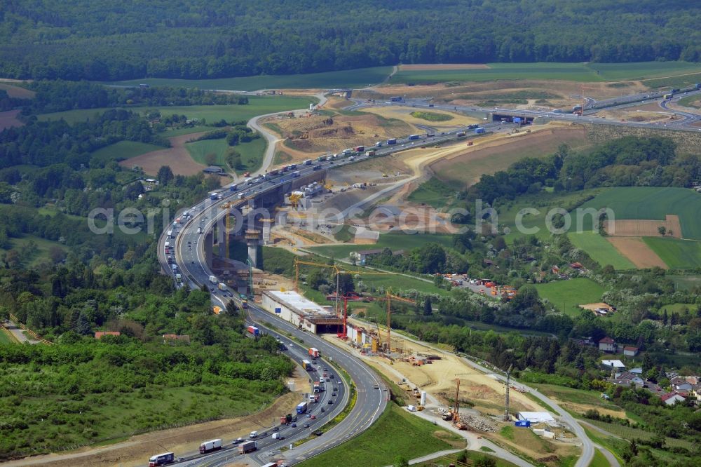 Aerial image Würzburg - Construction work at the Heidingsfeld valley bridge of the federal motorway A3 in the South of Wuerzburg in the state of Bavaria. The bridge spans a valley between two hills. In 2014 it was completely rebuilt by the Arbeitsgemeinschaft Talbruecke Heidingsfeld consisting of Ed. Zueblin AG, Direktion Brueckenbau Bereich Sued Ost und Donges Steeltec