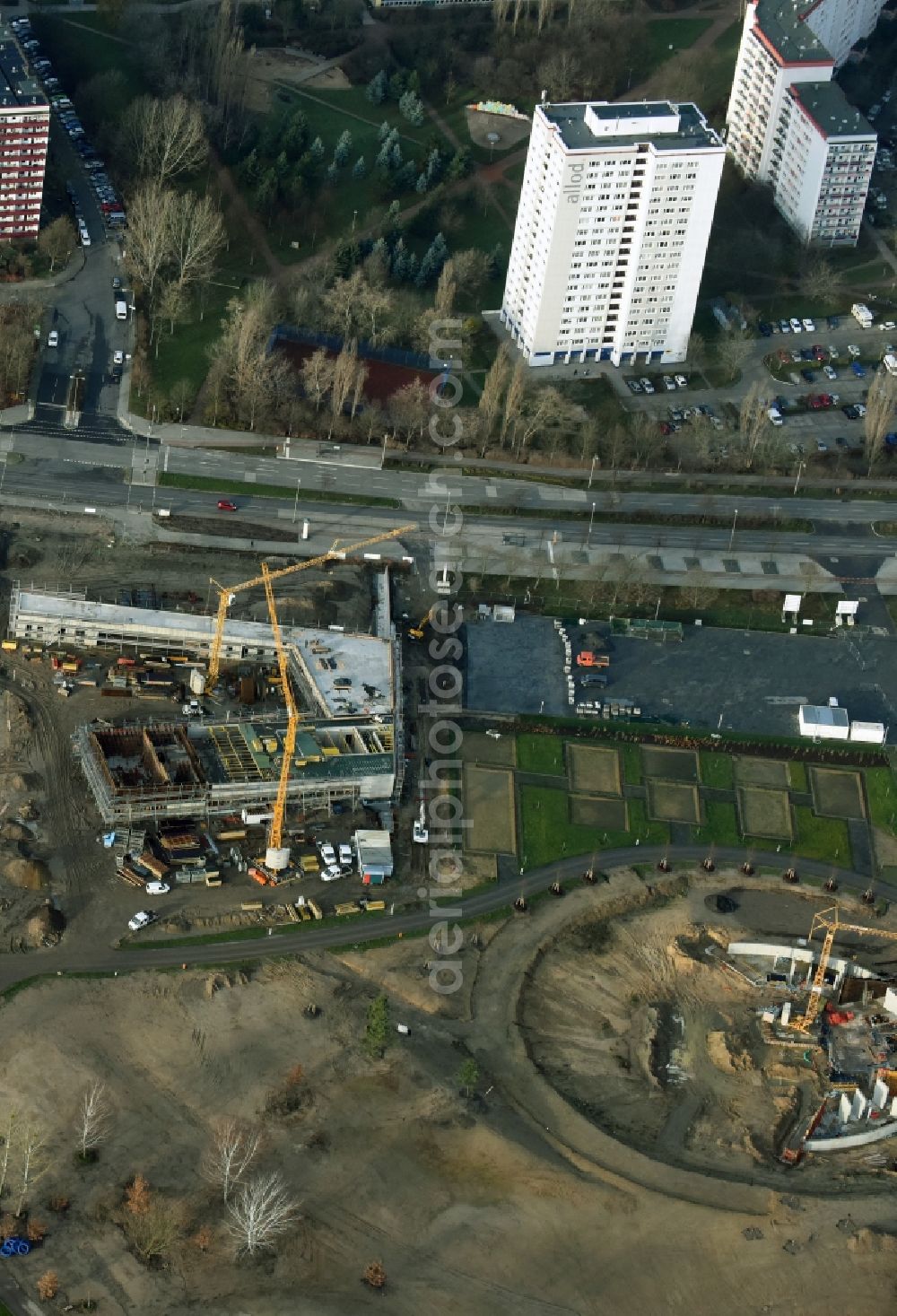 Aerial image Berlin - Construction work for the visitor's centre at the main entrance of the IGA 2017 in the district of Marzahn-Hellersdorf in Berlin. The heart of the International gerden exibition will be the Gaerten der Welt. The visitor's centre is being built near the main entrance on Blumberger Damm