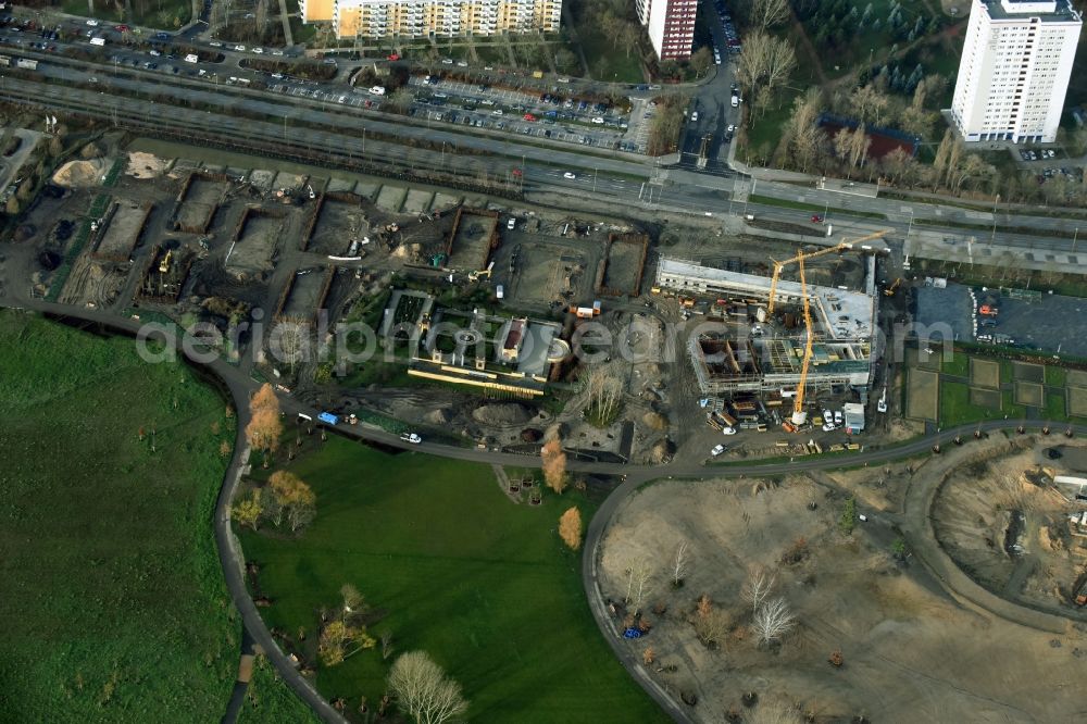 Aerial photograph Berlin - Construction work for the visitor's centre at the main entrance of the IGA 2017 in the district of Marzahn-Hellersdorf in Berlin. The heart of the International gerden exibition will be the Gaerten der Welt. The visitor's centre is being built near the main entrance on Blumberger Damm