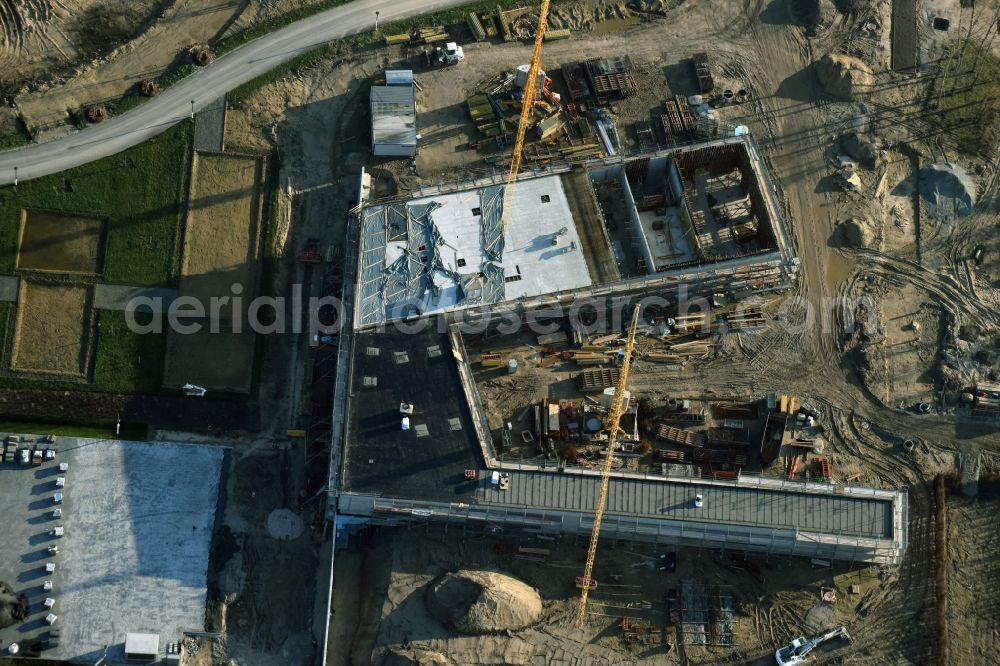 Aerial photograph Berlin - Construction work for the visitor's centre at the main entrance of the IGA 2017 in the district of Marzahn-Hellersdorf in Berlin. The heart of the International gerden exibition will be the Gaerten der Welt. The visitor's centre is being built near the main entrance on Blumberger Damm