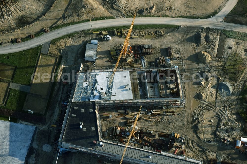 Berlin from above - Construction work for the visitor's centre at the main entrance of the IGA 2017 in the district of Marzahn-Hellersdorf in Berlin. The heart of the International gerden exibition will be the Gaerten der Welt. The visitor's centre is being built near the main entrance on Blumberger Damm