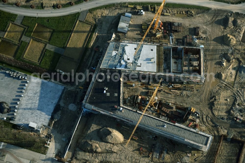 Berlin from the bird's eye view: Construction work for the visitor's centre at the main entrance of the IGA 2017 in the district of Marzahn-Hellersdorf in Berlin. The heart of the International gerden exibition will be the Gaerten der Welt. The visitor's centre is being built near the main entrance on Blumberger Damm