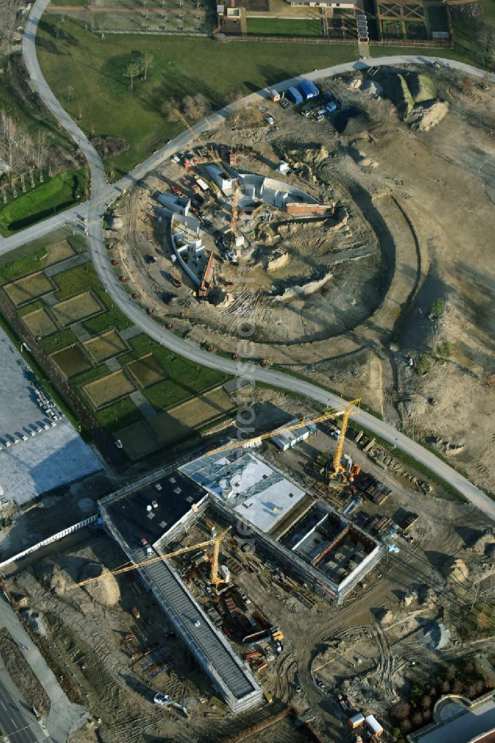 Aerial image Berlin - Construction work for the visitor's centre at the main entrance of the IGA 2017 in the district of Marzahn-Hellersdorf in Berlin. The heart of the International gerden exibition will be the Gaerten der Welt. The visitor's centre is being built near the main entrance on Blumberger Damm