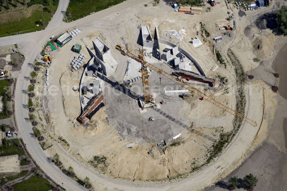 Berlin from the bird's eye view: Construction work for the visitor's centre at the main entrance of the IGA 2017 in the district of Marzahn-Hellersdorf in Berlin. The heart of the International garden exibition will be the Gaerten der Welt