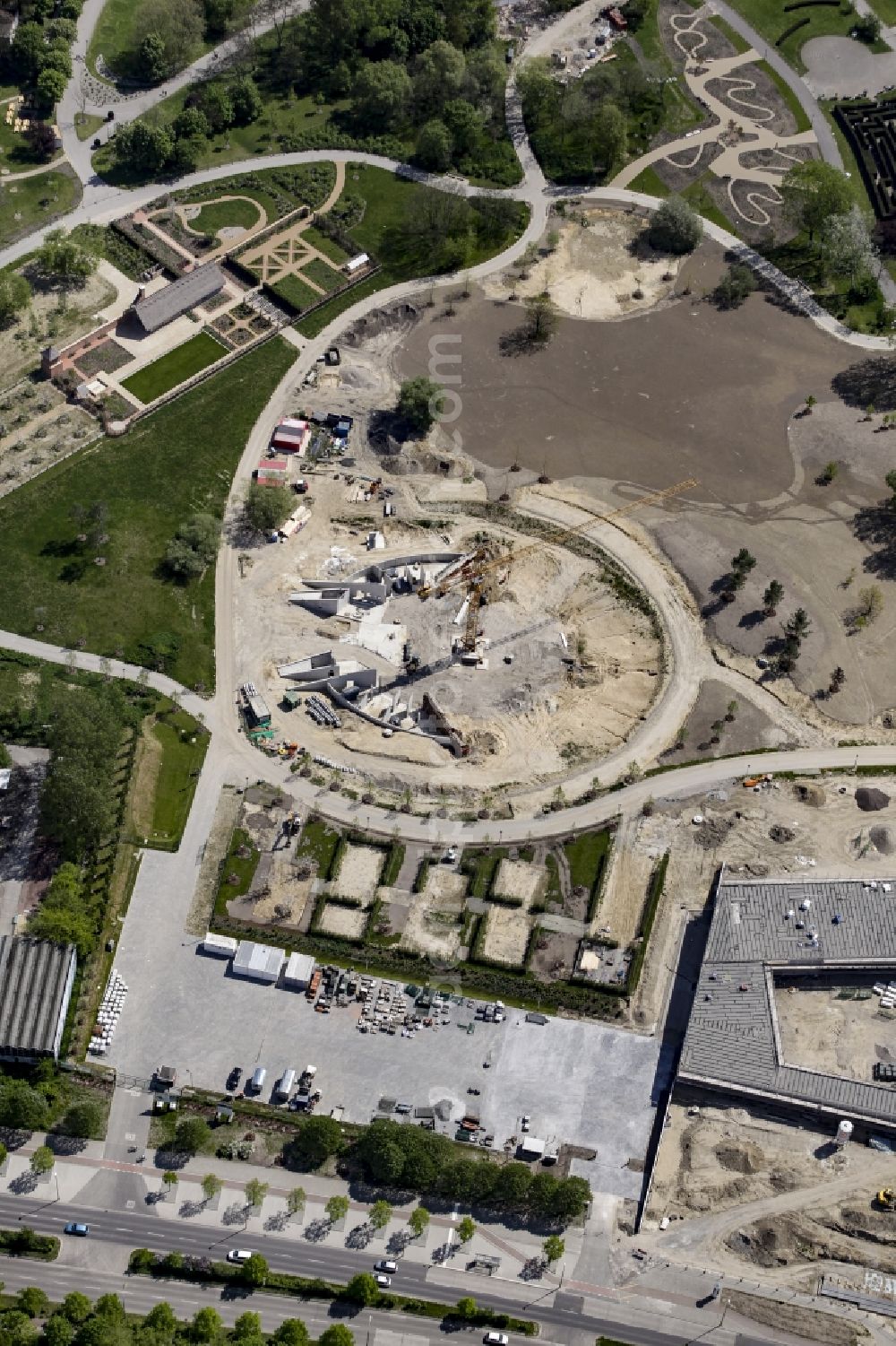 Berlin from above - Construction work for the visitor's centre at the main entrance of the IGA 2017 in the district of Marzahn-Hellersdorf in Berlin. The heart of the International garden exibition will be the Gaerten der Welt