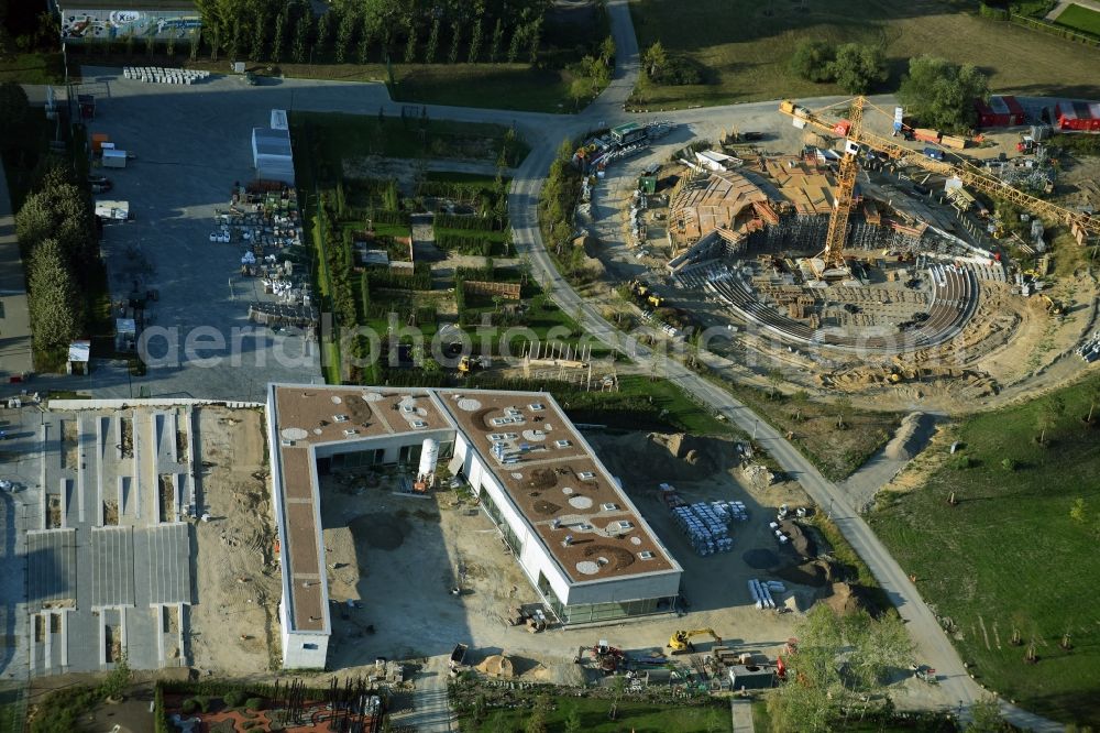 Aerial photograph Berlin - Construction work for the visitor's centre at the main entrance of the IGA 2017 in the district of Marzahn-Hellersdorf in Berlin. The heart of the International gerden exibition will be the Gaerten der Welt. The visitor's centre is being built near the main entrance on Blumberger Damm