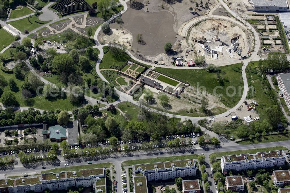 Berlin from above - Construction work for the visitor's centre at the main entrance on Blumberger Damm of the IGA 2017 in the district of Marzahn-Hellersdorf in Berlin. The heart of the International gerden exibition will be the Gaerten der Welt. The visitor's centre is being built near the main entrance on Blumberger Damm