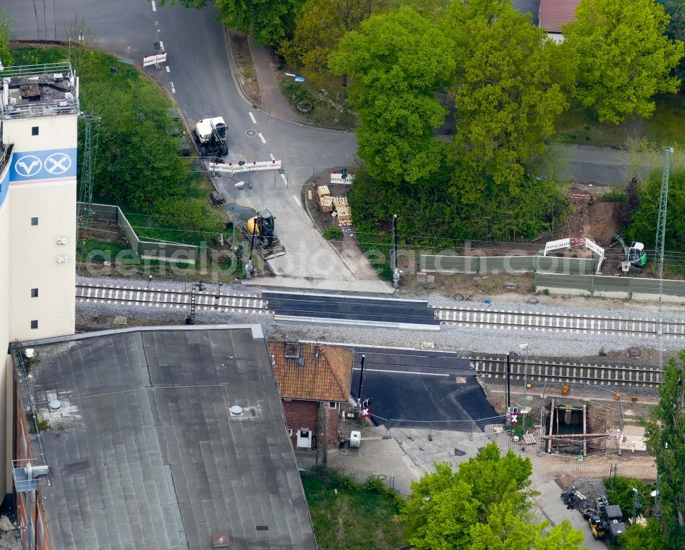 Rosdorf from above - Construction work for the reconstruction of the railway crossing in Rosdorf in the state Lower Saxony, Germany