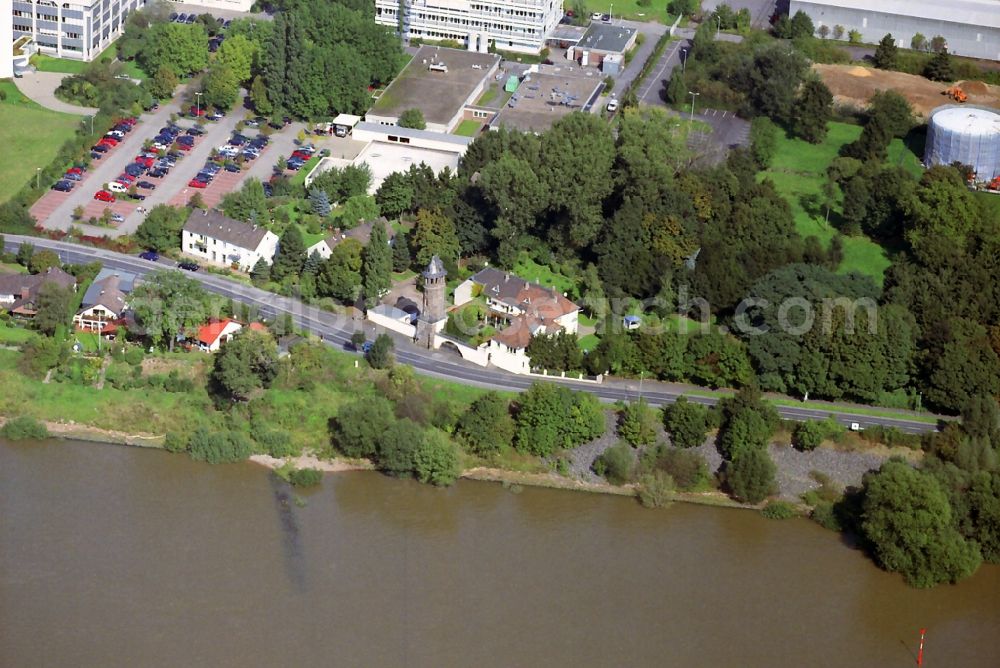 Monheim from the bird's eye view: Monument and landmark of the tower Mouse Tower on the banks of the Rhine in Mohnheim in North Rhine-Westphalia