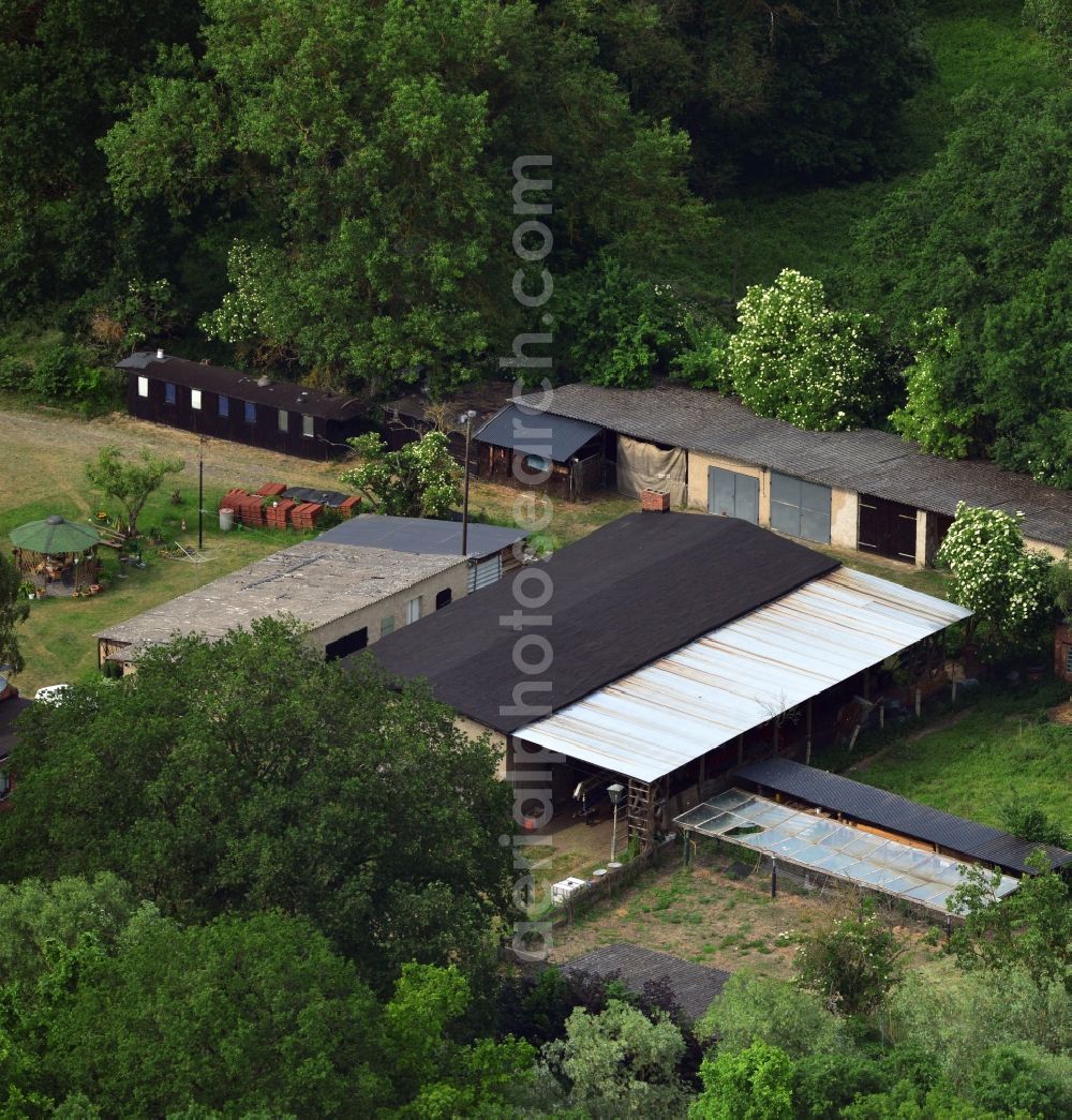 Wittenberge from above - Small farm outside of Wittenberge in the state Brandenburg. The site with its agricultural storage sheds is located at the street Dierowstückenweg