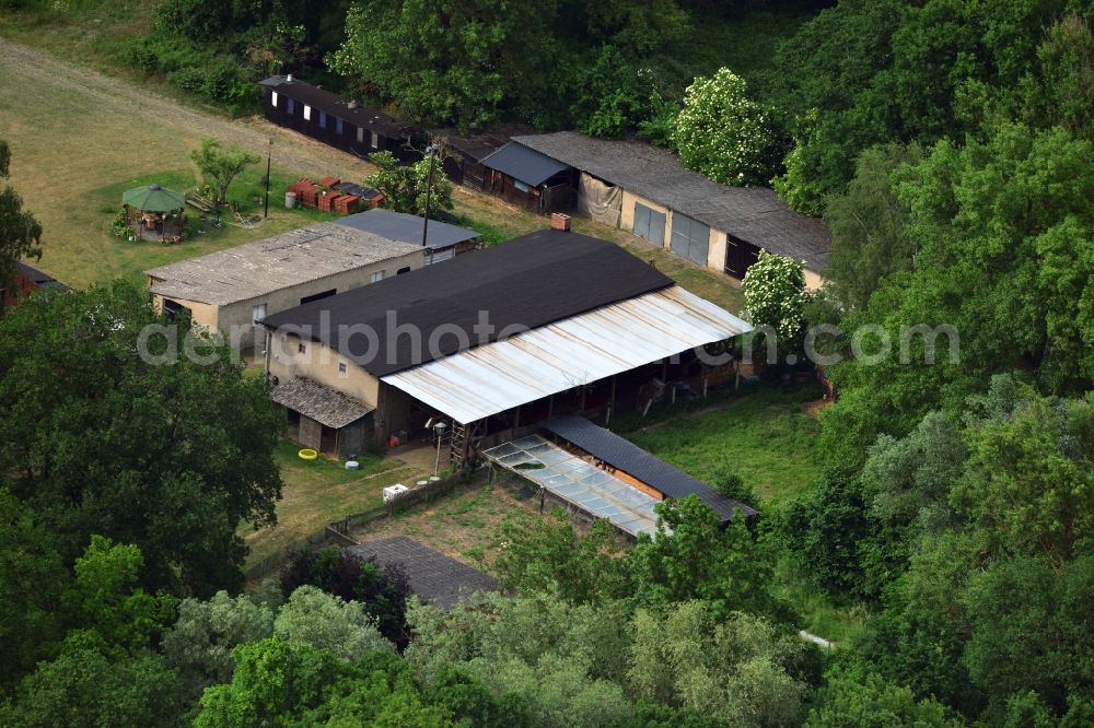 Aerial image Wittenberge - Small farm outside of Wittenberge in the state Brandenburg. The site with its agricultural storage sheds is located at the street Dierowstückenweg