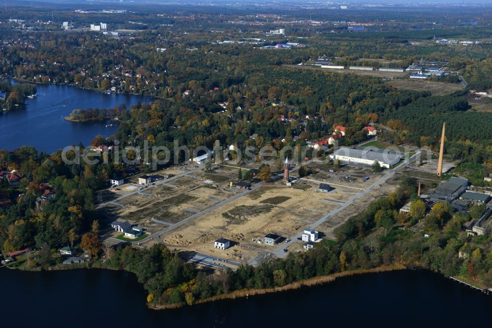 Königs Wusterhausen from the bird's eye view: Construction site of the future residential area Koenigsufer on the banks of Zernsee on Wustroweg in Koenigs Wusterhausen in Brandenburg