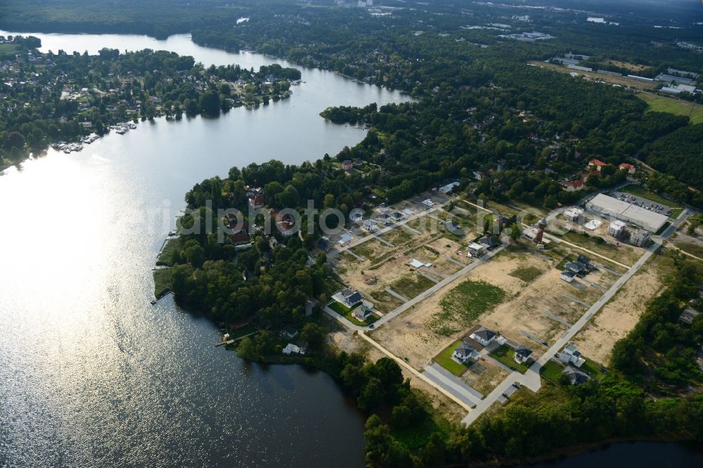 Aerial photograph Königs Wusterhausen - Construction site of the future residential area Koenigsufer on the banks of Zernsee on Wustroweg in Koenigs Wusterhausen in Brandenburg