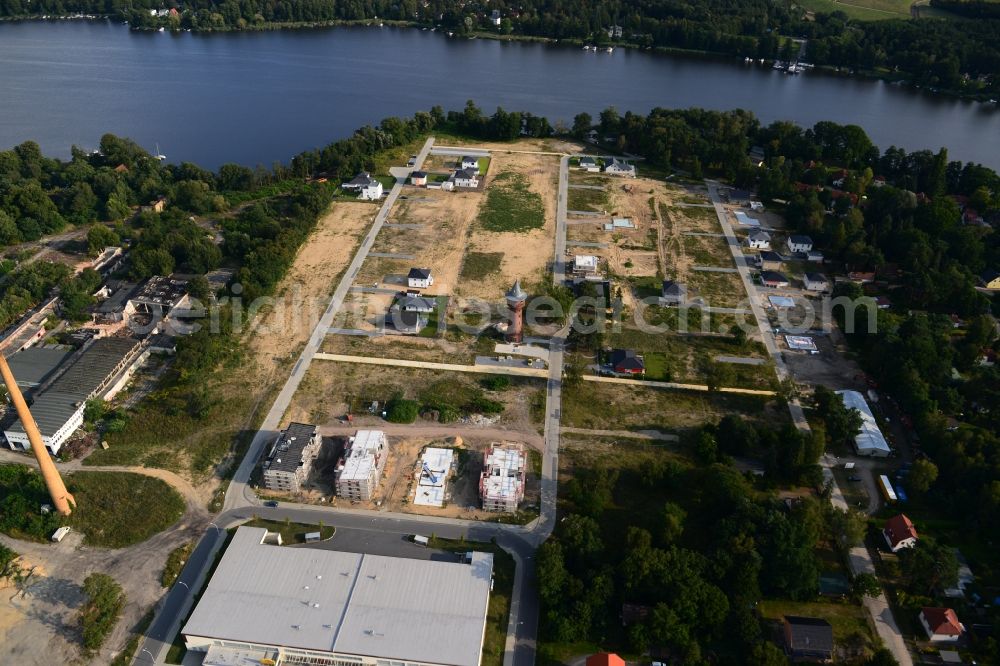 Königs Wusterhausen from the bird's eye view: Construction site of the future residential area Koenigsufer on the banks of Zernsee on Wustroweg in Koenigs Wusterhausen in Brandenburg