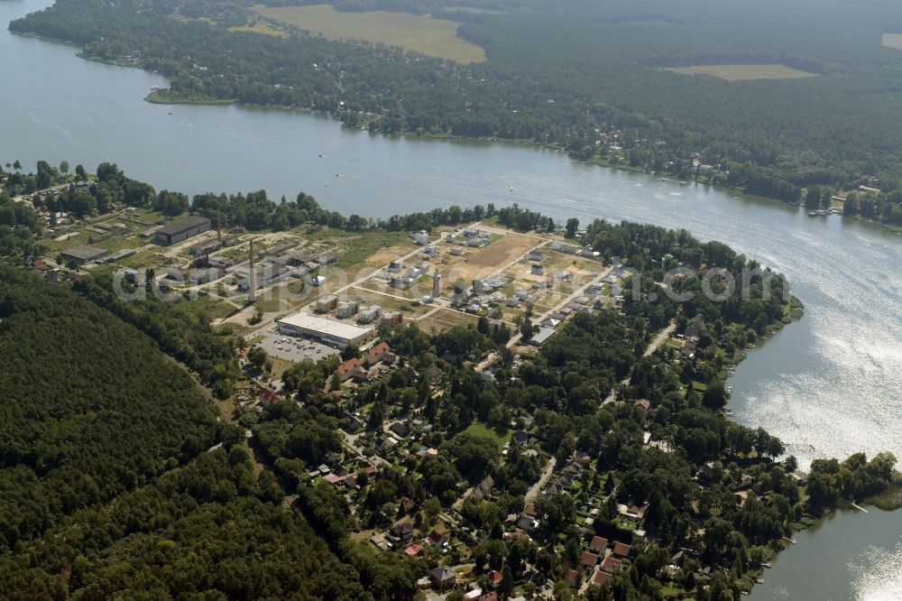 Königs Wusterhausen from the bird's eye view: Construction site of the future residential area Koenigsufer on the banks of Zernsee on Wustroweg in Koenigs Wusterhausen in Brandenburg