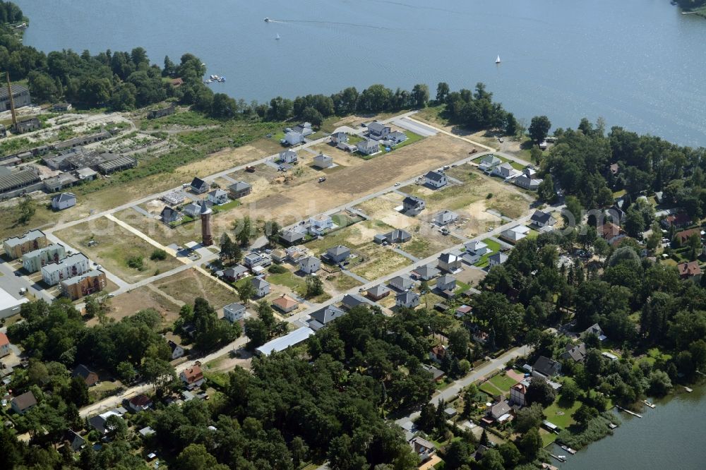 Königs Wusterhausen from the bird's eye view: Construction site of the future residential area Koenigsufer on the banks of Zernsee on Wustroweg in Koenigs Wusterhausen in Brandenburg