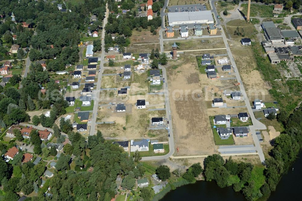 Königs Wusterhausen from the bird's eye view: Construction site of the future residential area Koenigsufer on the banks of Zernsee on Wustroweg in Koenigs Wusterhausen in Brandenburg