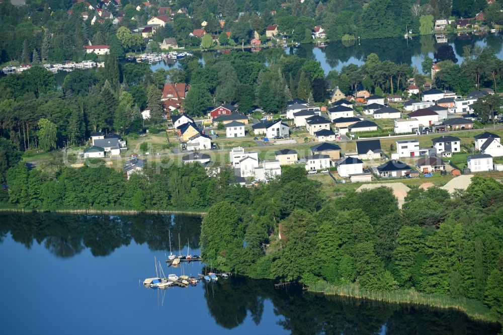 Aerial photograph Königs Wusterhausen - Construction site of the future residential area Koenigsufer on the banks of Zernsee on Wustroweg destrict Zernsdorf in Koenigs Wusterhausen in Brandenburg