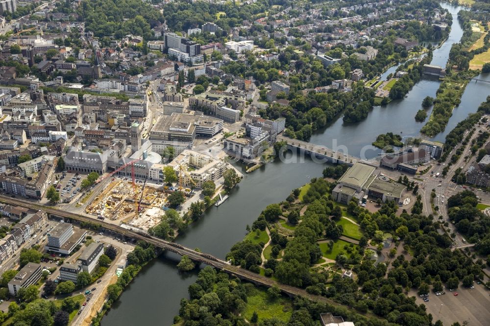 Mülheim an der Ruhr from above - Construction site in Muelheim an der Ruhr in the state North Rhine-Westphalia. It is a part of the development project Ruhrbania and is located on the Bahnstrasse at the Ruhr. On the construction site 2 the Porr Deutschland GmbH builds in the context of the building project Spot several buildings with flats. The Muelheimer Wohnungsbau eG (MWB) is the client of the building project