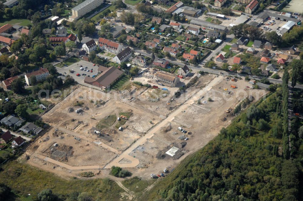 Berlin from above - Blick auf die Baugrundstücke in Wartenberg Berlin-Hohenschönhausen. Das Bauvorhaben Wartenberger Luch ensteht auf der beräumten Fläche der einstigen DDR-Vorzeige LPG 1. Mai in Wartenberg. Die in Liquidation befindliche Landwirtschaftliche Produktionsgenossenschaft wurde 1953 durch den Zusammenschluss von 45 Gärtnern, Bauern und Landarbeitern gegründet.