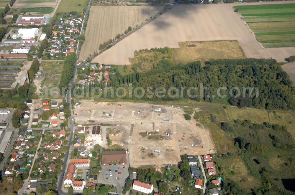 Berlin from the bird's eye view: Blick auf die Baugrundstücke in Wartenberg Berlin-Hohenschönhausen. Das Bauvorhaben Wartenberger Luch ensteht auf der beräumten Fläche der einstigen DDR-Vorzeige LPG 1. Mai in Wartenberg. Die in Liquidation befindliche Landwirtschaftliche Produktionsgenossenschaft wurde 1953 durch den Zusammenschluss von 45 Gärtnern, Bauern und Landarbeitern gegründet.