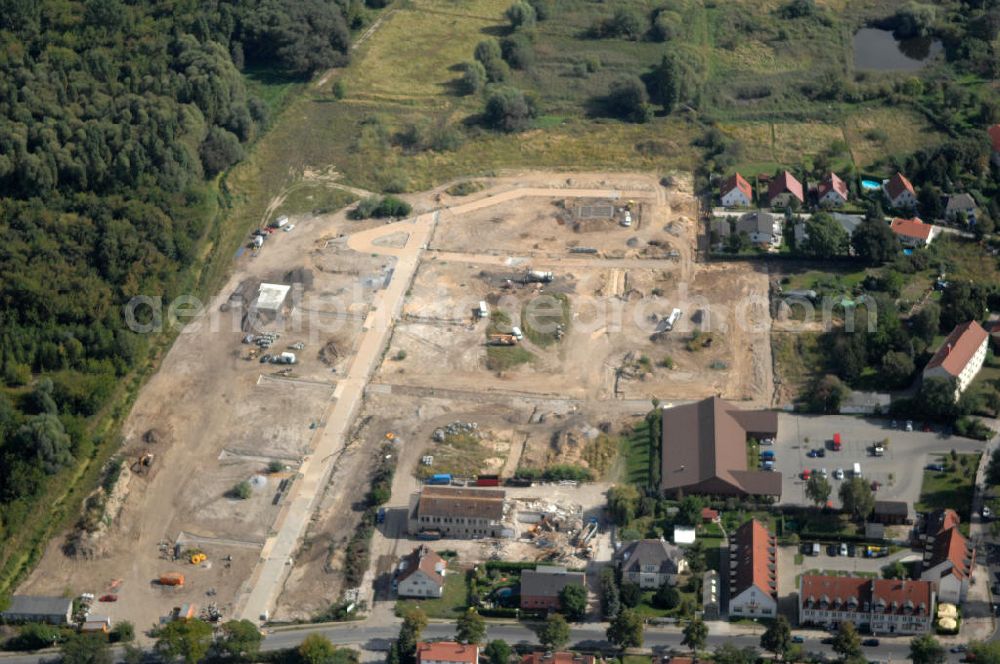 Aerial image Berlin - Blick auf die Baugrundstücke in Wartenberg Berlin-Hohenschönhausen. Das Bauvorhaben Wartenberger Luch ensteht auf der beräumten Fläche der einstigen DDR-Vorzeige LPG 1. Mai in Wartenberg. Die in Liquidation befindliche Landwirtschaftliche Produktionsgenossenschaft wurde 1953 durch den Zusammenschluss von 45 Gärtnern, Bauern und Landarbeitern gegründet.