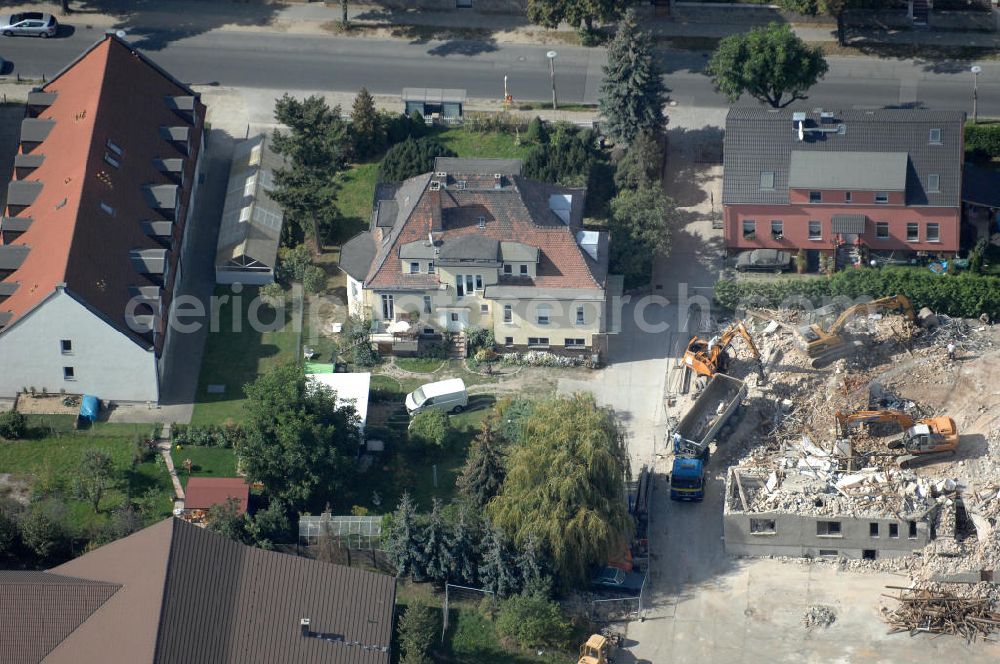 Berlin from the bird's eye view: Blick auf die Baugrundstücke in Wartenberg Berlin-Hohenschönhausen. Das Bauvorhaben Wartenberger Luch ensteht auf der beräumten Fläche der einstigen DDR-Vorzeige LPG 1. Mai in Wartenberg. Die in Liquidation befindliche Landwirtschaftliche Produktionsgenossenschaft wurde 1953 durch den Zusammenschluss von 45 Gärtnern, Bauern und Landarbeitern gegründet.