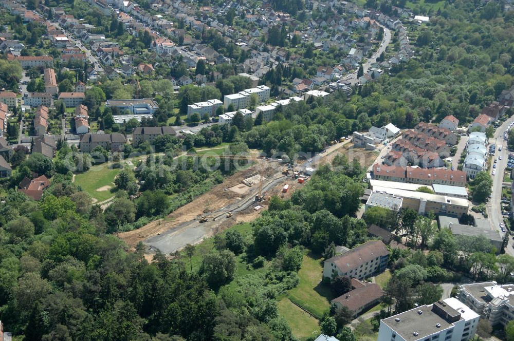 Aerial photograph Bad Vilbel - Blick die Baustelle der Wohnanlage am Tannenweg der cds Wohnbau GmbH. In Waldrandlage entstehen hier mehrere Wohnneubauten durch die cds Wohnbau GmbH, einem Frankfurter Immobiliendienstleister. View the construction site of new development on Tannenweg. At the forest are several new residential buildings caused by the CDS Wohnbau GmbH, a Frankfurt real estate service providers.