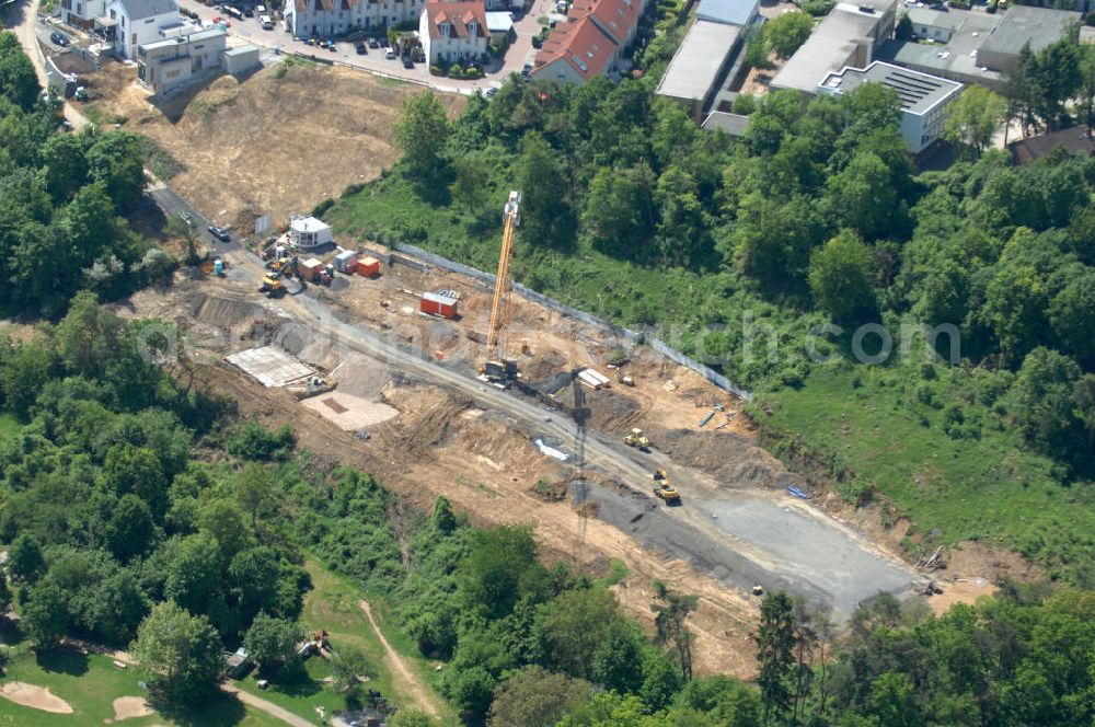 Aerial image Bad Vilbel - Blick die Baustelle der Wohnanlage am Tannenweg der cds Wohnbau GmbH. In Waldrandlage entstehen hier mehrere Wohnneubauten durch die cds Wohnbau GmbH, einem Frankfurter Immobiliendienstleister. View the construction site of new development on Tannenweg. At the forest are several new residential buildings caused by the CDS Wohnbau GmbH, a Frankfurt real estate service providers.