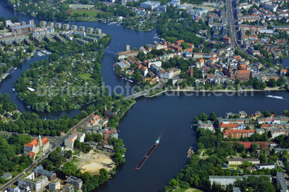 Berlin Köpenick from the bird's eye view: Construction site for new residential construction of RESIDENTIAL QUARTER UFERKRONE at the riverside at Linden Street in Berlin Koepenick