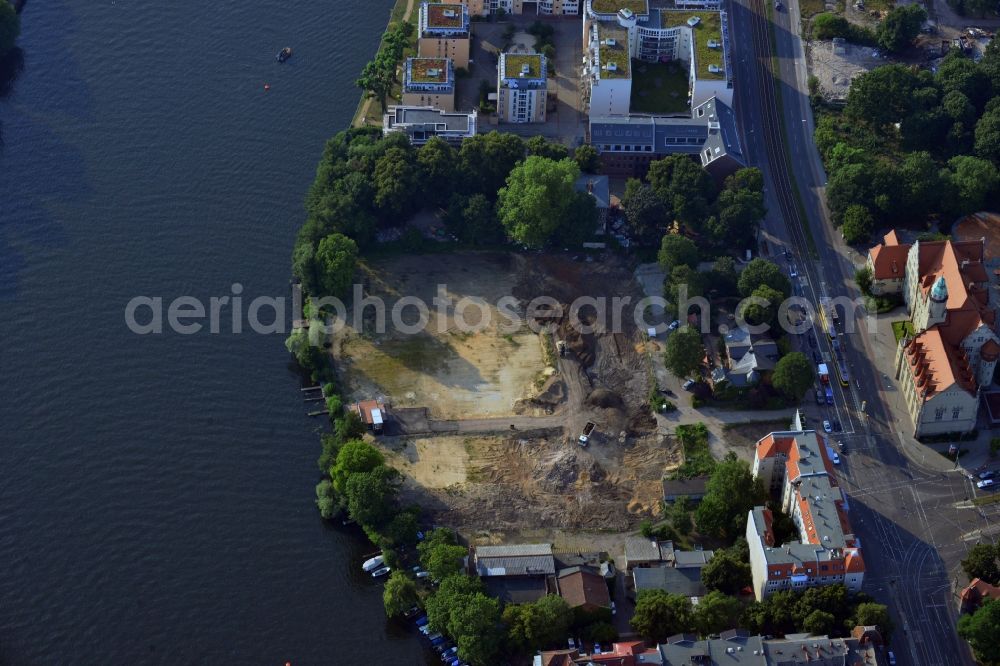 Berlin Köpenick from the bird's eye view: Construction site for new residential construction of RESIDENTIAL QUARTER UFERKRONE at the riverside at Linden Street in Berlin Koepenick