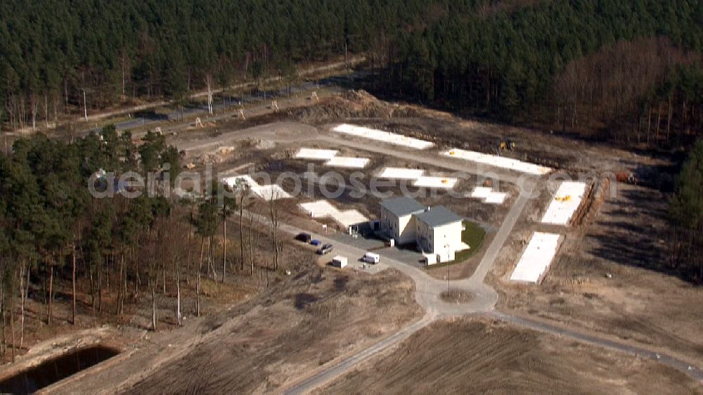 Graal Müritz from the bird's eye view: Video vom Baufeld zur Errichtung von Ferienwohnungen im Küstenwald, einem Wohngebiet der HAWO Bauträger KG in unmittelbarer Strandnähe. Die ehemalige Militärliegenschaft der DDR-Armee NVA ist ein Musterprojekt für Konversion in der Region. Video of the building land for holiday apartments close by the beach on the Baltic Sea.