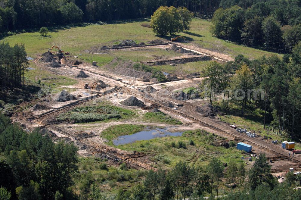 Aerial photograph Graal-Müritz - Blick auf das Baufeld zur Errichtung von Ferienwohnungen im Küstenwald, einem Wohngebiet der HAWO Bauträger KG in unmittelbarer Strandnähe. Die ehemalige Militärliegenschaft der DDR-Armee NVA ist ein Musterprojekt für Konversion in der Region.