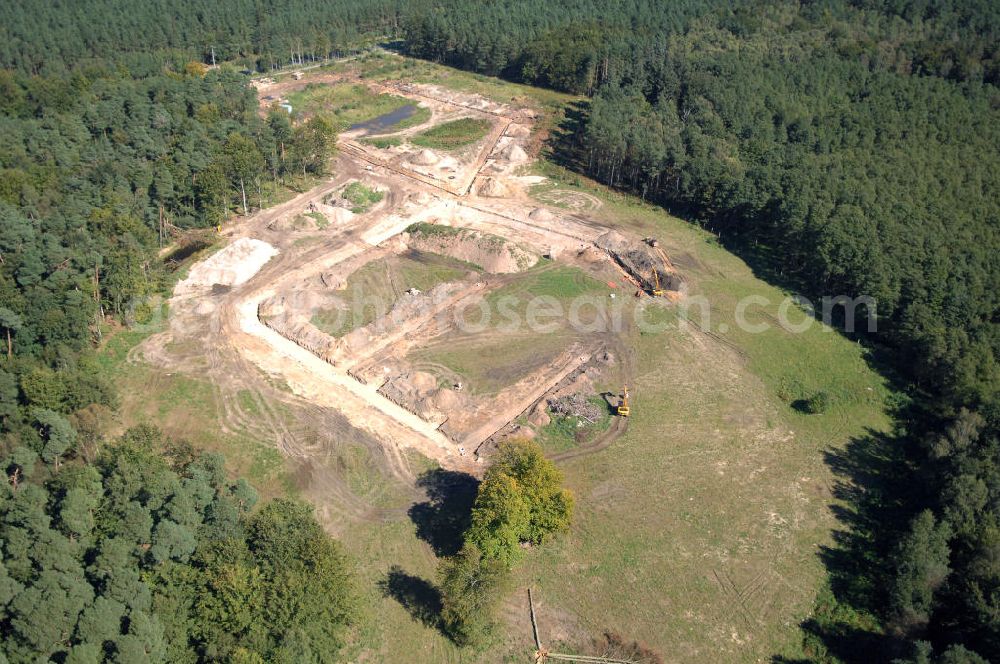 Aerial photograph Graal-Müritz - Blick auf das Baufeld zur Errichtung von Ferienwohnungen im Küstenwald, einem Wohngebiet der HAWO Bauträger KG in unmittelbarer Strandnähe. Die ehemalige Militärliegenschaft der DDR-Armee NVA ist ein Musterprojekt für Konversion in der Region.