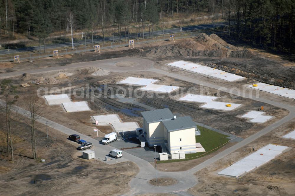 Aerial photograph Graal-Müritz - Blick auf das Baufeld zur Errichtung von Ferienwohnungen im Küstenwald, einem Wohngebiet der HAWO Bauträger KG in unmittelbarer Strandnähe. Die ehemalige Militärliegenschaft der DDR-Armee NVA ist ein Musterprojekt für Konversion in der Region.