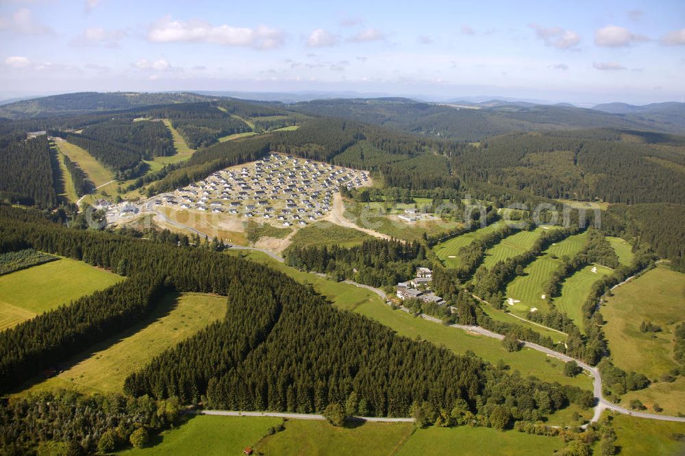 Winterberg from the bird's eye view: Baugebiet vom noch nicht fertiggestellten Landal Ferienpark in der Winterberger Büre in Winterberg, Nordrhein-Westfalen. Building area of the, yet not completely ready-made, Landal holiday park in Winterberg, North Rine-Westphalia.