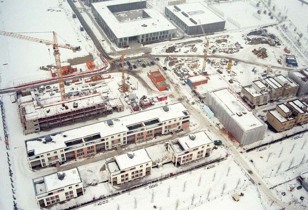 München / Bayern from the bird's eye view: 15.01.2006 München (Bayern):Blick auf das Baugelände des Wohngebietes nahe dem BUGA-Gelände. Die kleine Wohn-Anlage mit nur 4 niedrigen Häusern bietet einen freien Blick über das BUGA Gelände bis zu den Alpen.Beratungspavillion vor Ort: Willy-Brandt-Allee, 81829 München Mo-Fr. 14.00 - 17.00 Uhr, Sa/So 14.00 - 18.00 Uhr Anruf zum Ortstarif: Tel 01801 177 188, Fax 089 99 30 00 33 ; seepanorama-riem@conceptbau.de