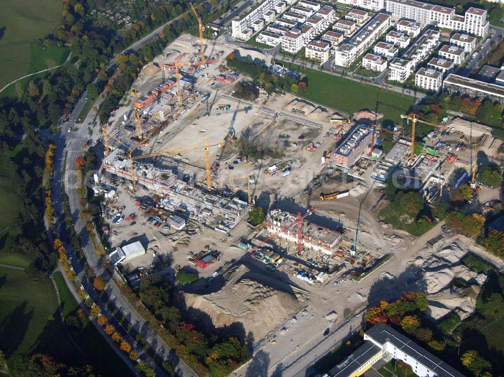 Aerial photograph München (Bayern) - Blick auf das Baugelände des Wohngebietes Olympiapark. Beim Ackermannbogen in Schwabing kommt das Beste zum Schluss: Mit CONCEPTBAUGOLD wird das letzte Grundstück direkt am Olympiapark bebaut. Beratungspavillion vor Ort: Ackermannstr. 49, 80797 München,Mo-So 14.00 - 18.00 UhrAnruf zum Ortstarif:Telefon: 01801. 266 277, Fax: 089.350 949-41, gold@conceptbau.de