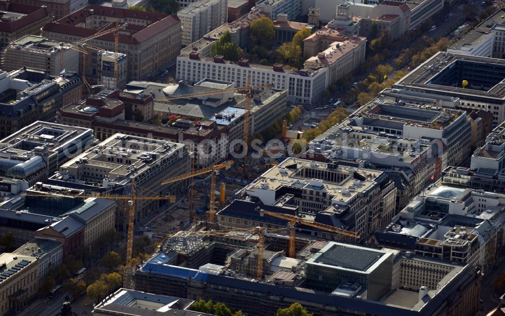 Aerial image Berlin - View of the construction work on the boulevard and the building of the Staatsbibliothek Unter den Linden in Berlin - Mitte. The construction work on the boulevard are due to the construction of the future subway station Unter den Linden . As part of the extension of the U5 a new crossing station is being built. The house Unter den Linden of the Staatsbibliothek of Berlin Preussischer Kulturbesitz was inaugurated in 1914 and heavily damaged during the Second World War. It is being totally renovated and modernized according to plans by the architect and museum designer HG Merz