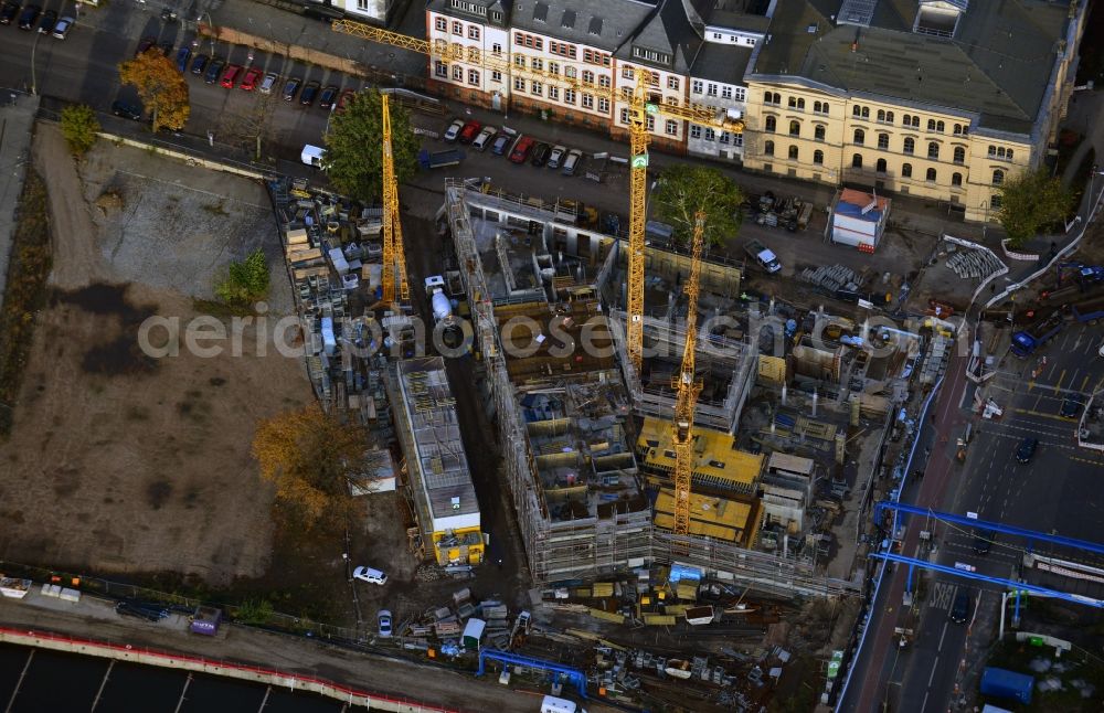 Aerial image Berlin - Construction activities on the development area Europa City at Heidestrasse near the central station in the district of Moabit in Berlin - Mitte. The plot at the crossways with Invalidenstrasse is location for the developement of a modern urban district with residential housing, office buildings and space for art and retail. Main owner of the land in the project area are CA Immo Germany, the German Bahn AG and the State of Berlin