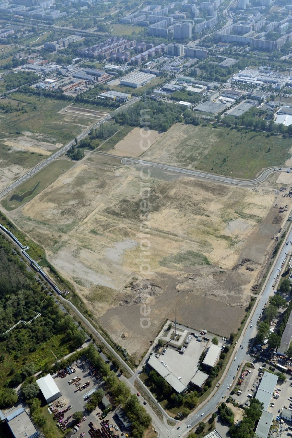 Berlin from the bird's eye view: Building area on site of the former wastewater treatment plant Falkenberg in the district of Marzahn-Hellersdorf in Berlin in Germany. The are in the East of Hohenschoenhauser Strasse and in the North of Bitterfelder Strasse will be used industrially. View from the West