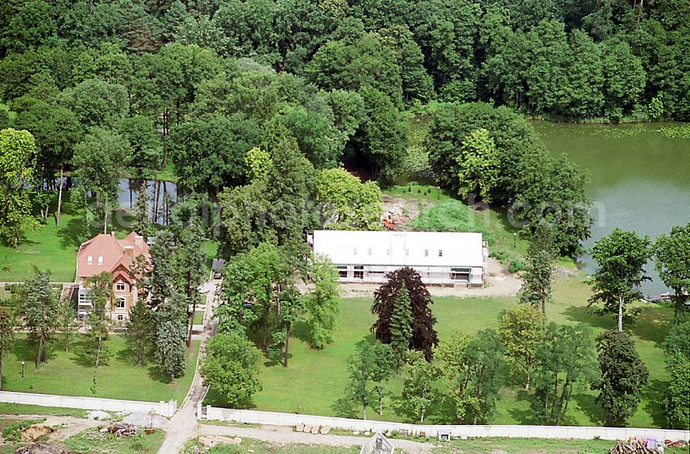 Eggersdorf / Brandenburg from the bird's eye view: Baugrundstück am See südwestlich des Flugplatzes Eggersdorf