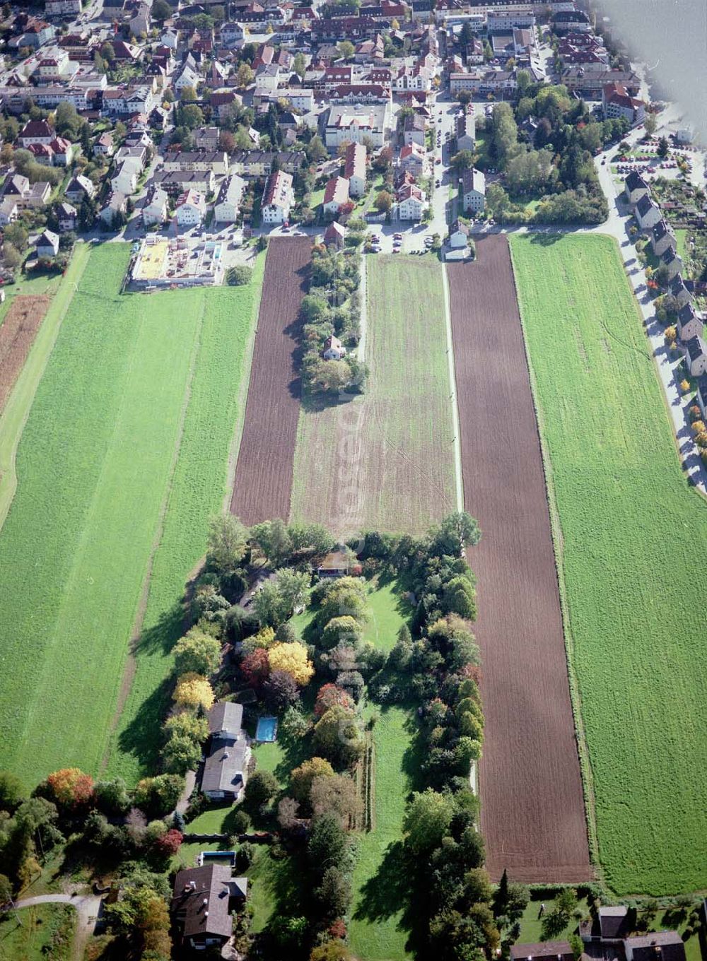 Freilassing / Bayern from the bird's eye view: Baugrundstück Sonnenfeld der Unternehmensgruppe MAX AICHER in Freilassing.