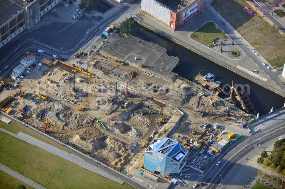 Aerial photograph Berlin - View at the ground preparation for the planned Berlin castle - Humboldt Forum on the grounds of the former city castle in the district Mitte in Berlin. Executing enterprise is the company Bilfinger Berger SE