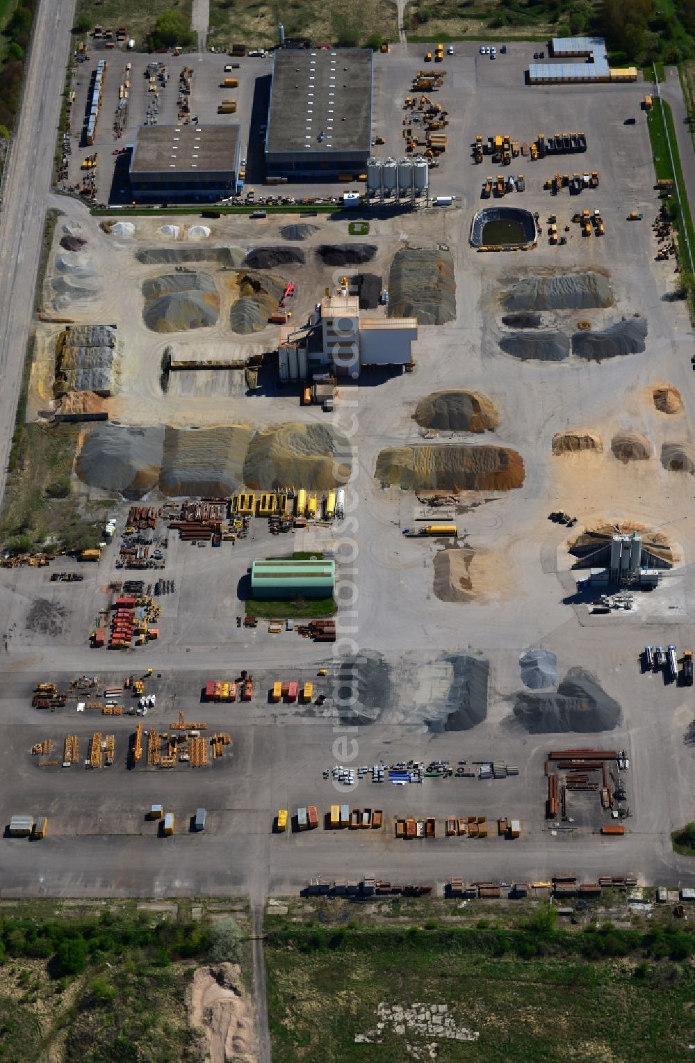 Werneuchen from the bird's eye view: Yard and construction work of Berger Bau GmbH on industrial estate in Werneuchen in Brandenburg