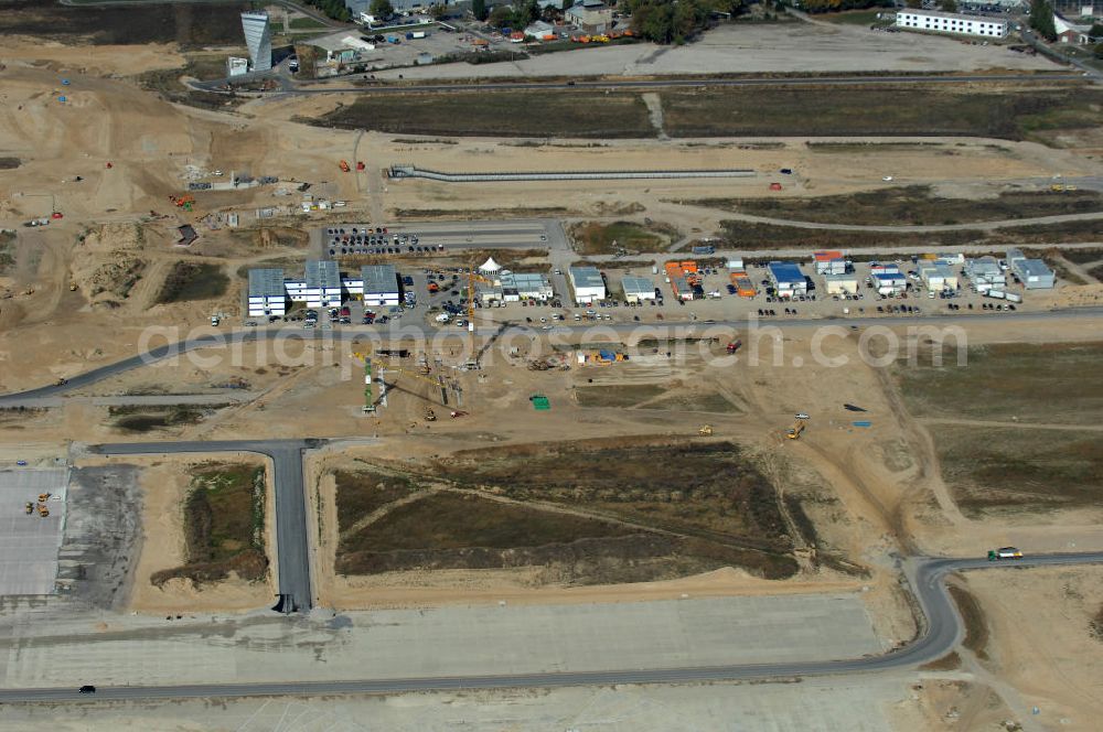 Aerial image Schönefeld - Blick auf Baulogistik- Bereiche am Neubaufeld zum Flughafen Berlin-Schönefeld BBI (SXF) Ausführende Firmen: Hochtief AG; EUROVIA Beton; PORR; BERGER Bau; Kark Weiss; Matthai; Schäler Bau Berlin GmbH; STRABAG; MAX BÖGL